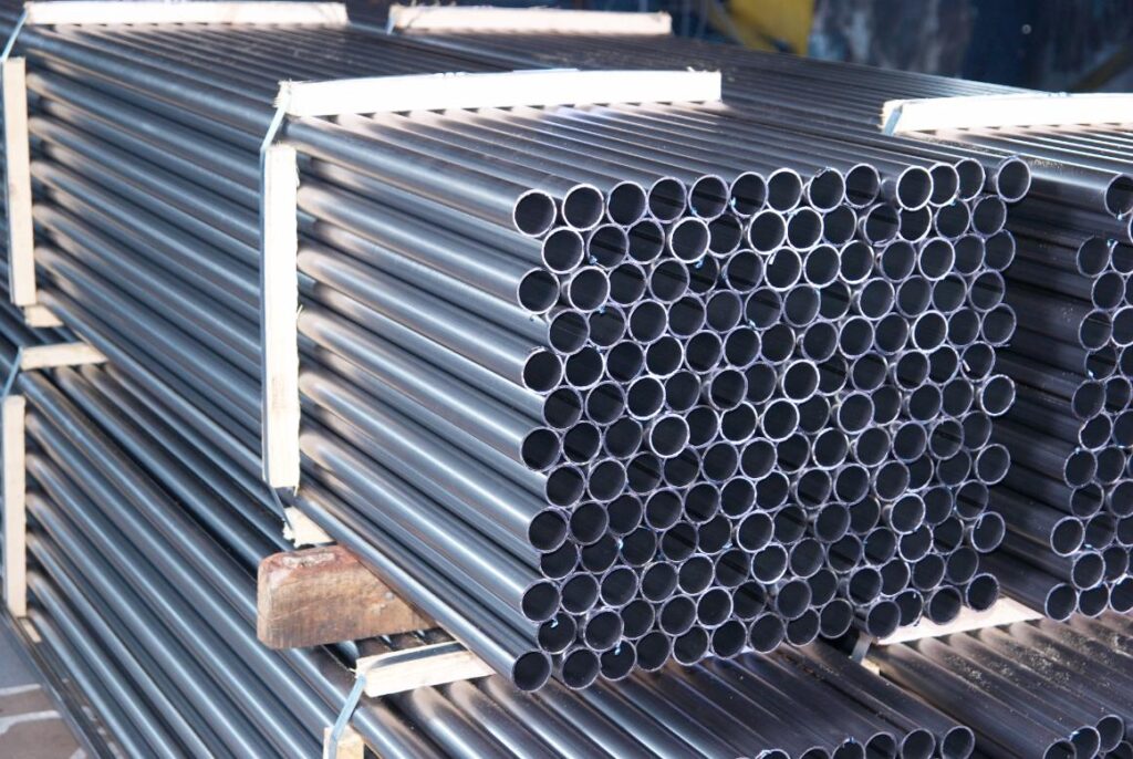 Process Water 2 Steel Pipes Bunch On The Rack In Warehouse