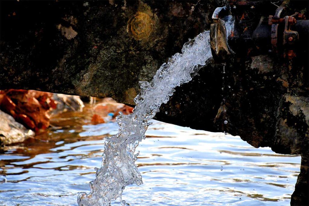 Water Is Life Water Pouring Out Of A Pipe Fres